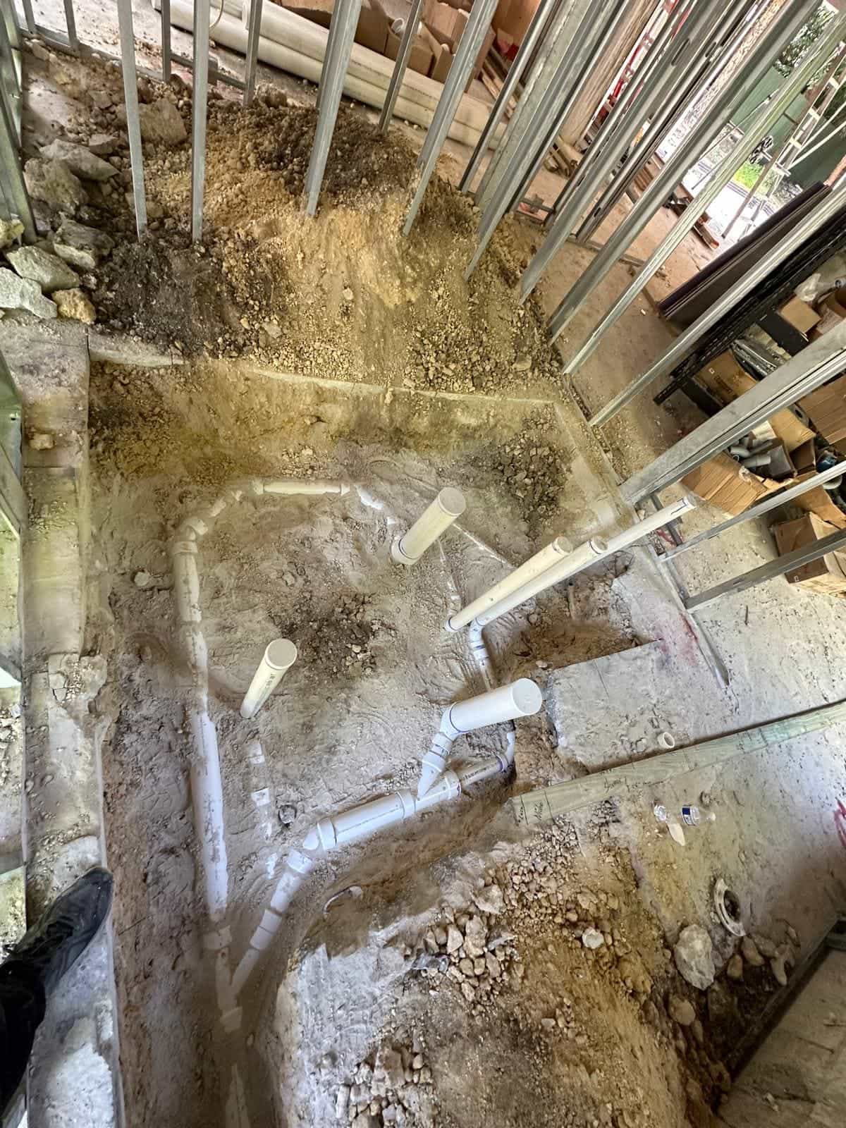 Before and after of a Underground pipe assemply by a plumber in Dadeland