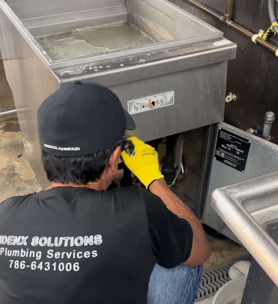 Plumber in Dadeland working on a project