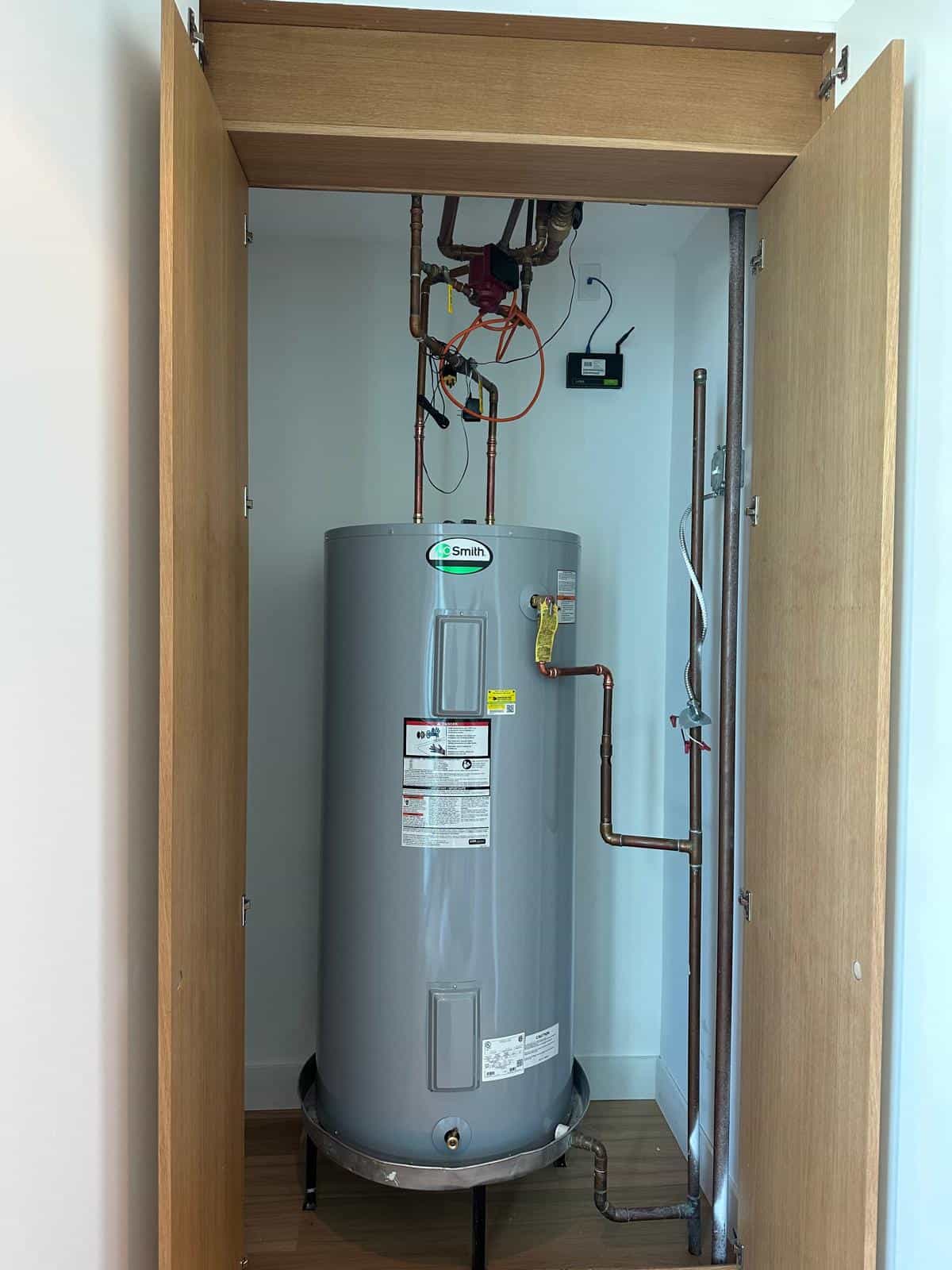 Before and after of a Water Heater by a plumber in Dadeland